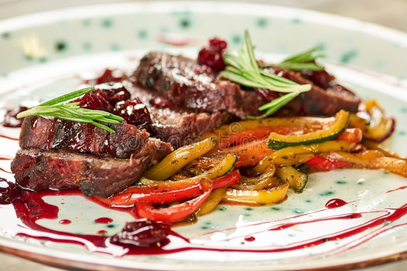 Grilled Steaks and Vegetables. Stock Photo Image of delicacy, cuisine