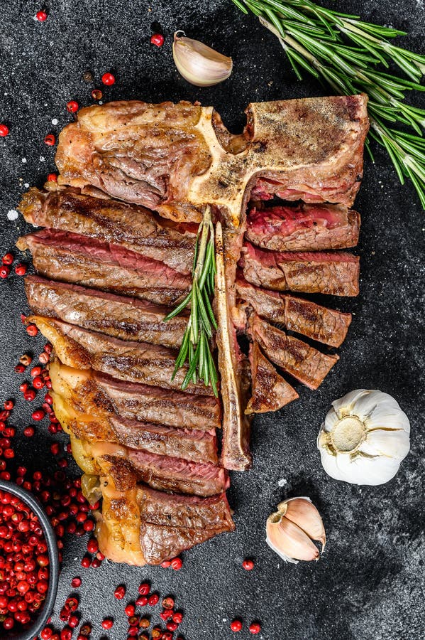 Grilled Tbone Steak. Cooked Tbone Beef. Black Background Stock Image