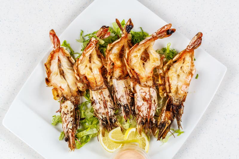 Grilled Tiger Prawns Served with Leafs and Lemon Stock Photo Image of