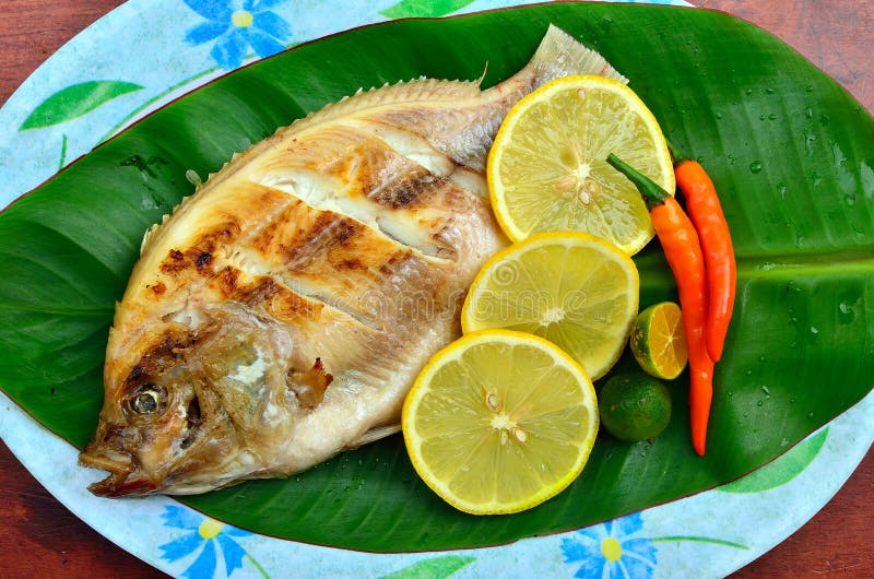 Grilled Tilapia with Lemon and Chili on Banana Leaves Stock Image Image of appetizing