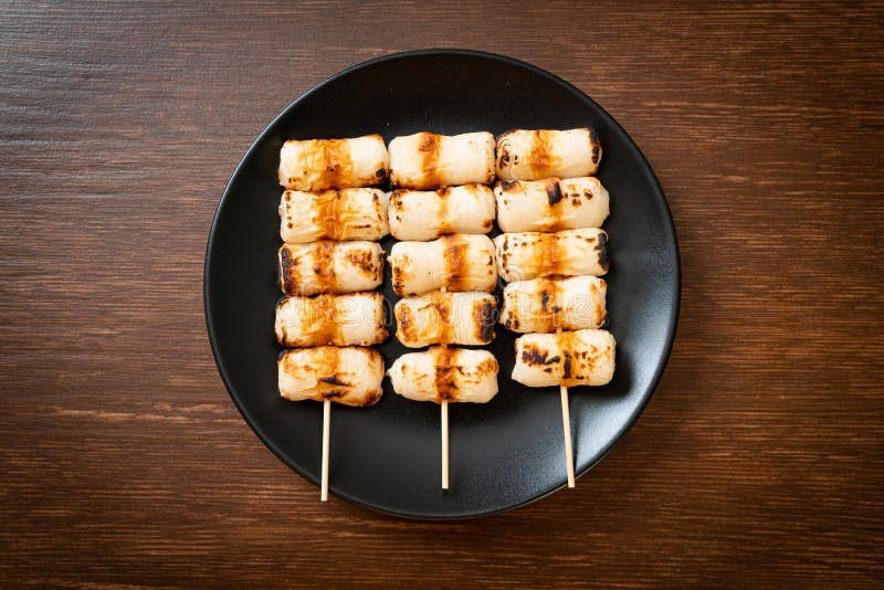 Grilled Tube Shaped Fish Paste Cake Skewe or Tube Squid Skewer Stock