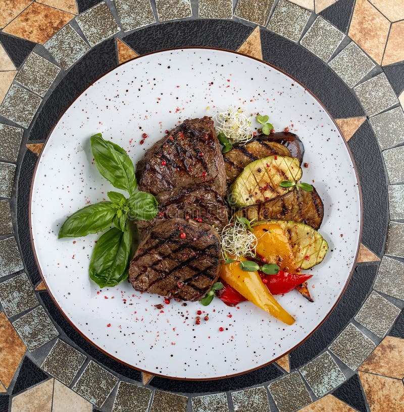 Grilled Veal Steak with Vegetables and Basil Stock Photo Image of