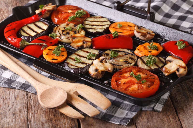 Grilled vegetables: peppers, tomato, onion, in pan grill