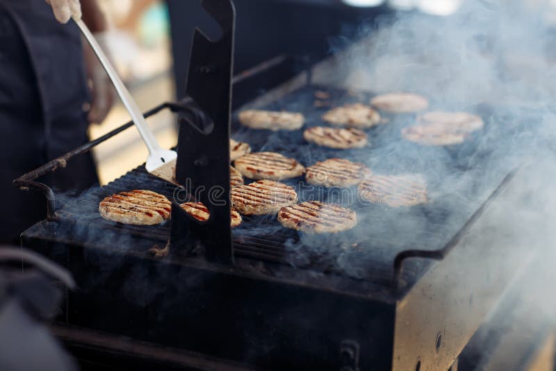The Grilling Process of Preparing Meat Cutlets for Burgers Stock Photo Image of hamburger
