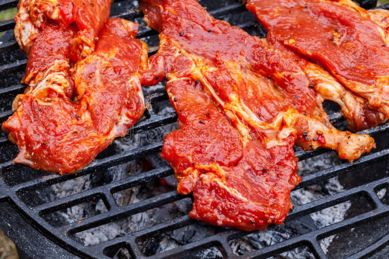 Grilling Raw Pork Steaks on Barbecue Grill Stock Image Image of focus