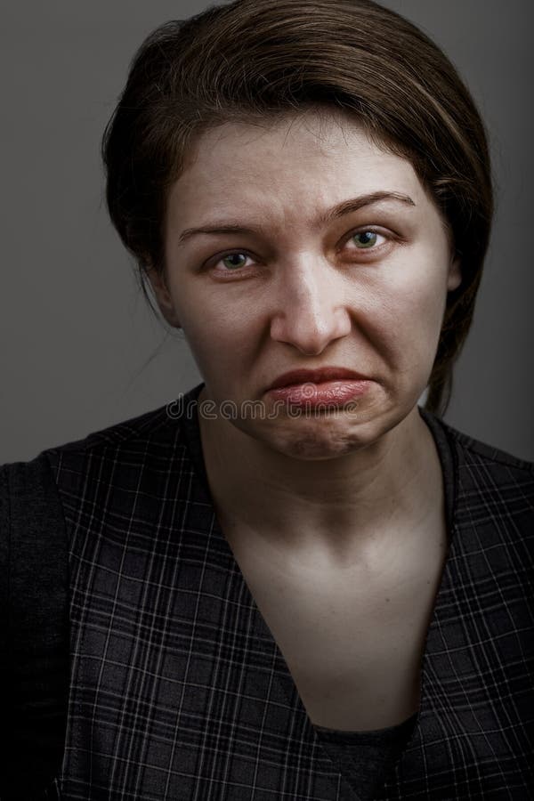 Grimasse der unglücklichen traurigen enttäuschten Frau lizenzfreies stockfoto Grimasse der unglücklichen traurigen enttäuschten Frau lizenzfreies stockfoto