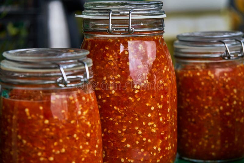 Hot pepper in jars stock image. Image of ingredient 103707145
