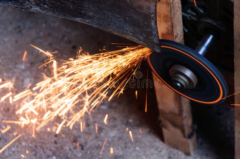 Grinding Blade with flame in factory royalty free stock images