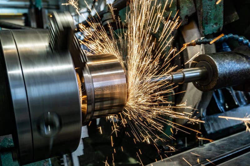 Grinding on a Circular Grinding Machine with Sparks, View from the Rear ...