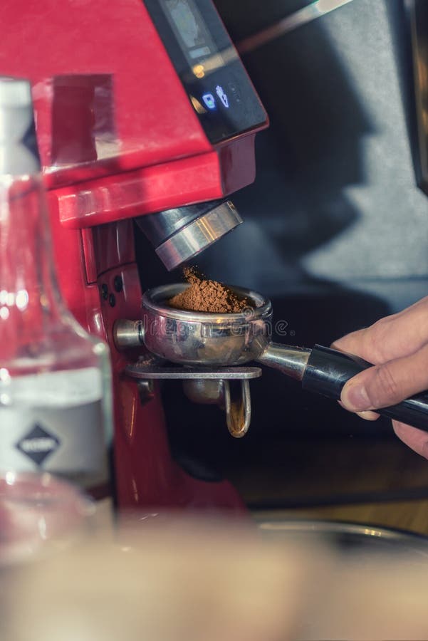 Barista Grinding Coffee stock photo. Image of coffeemaker 35667442