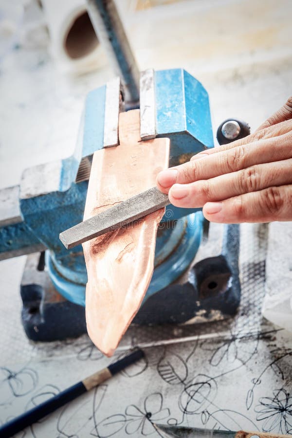 Grinding the Copper Billet with a File Stock Photo Image of machinery, copper 125807722