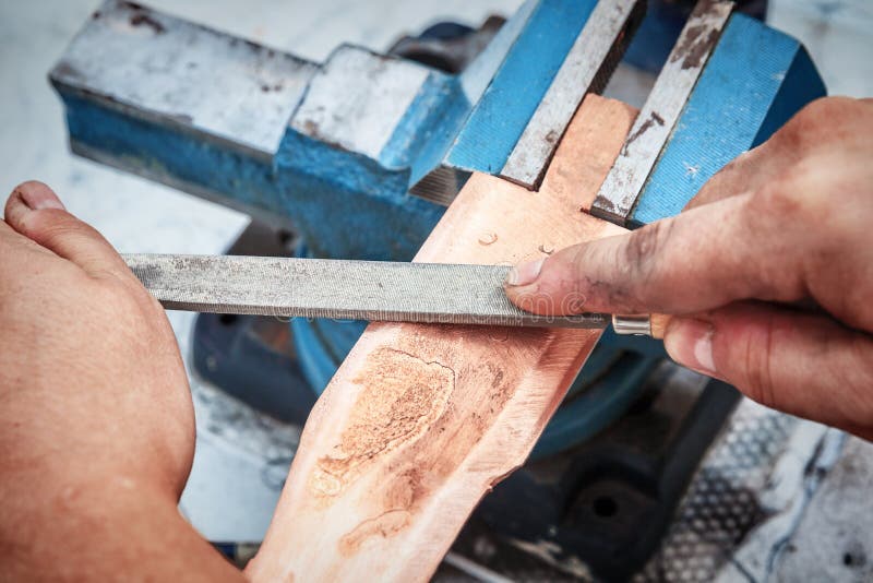 Grinding the Copper Billet with a File Stock Photo Image of component, machinery 125808050
