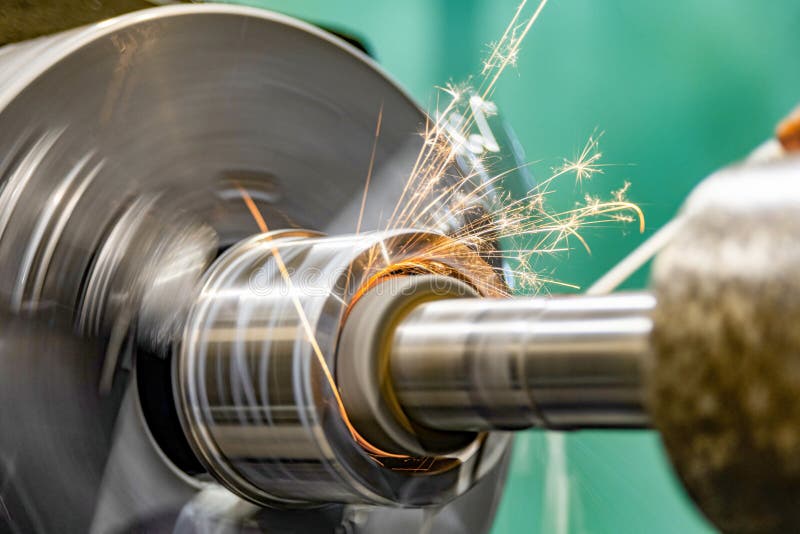 Grinding the Hole on a Cylindrical Grinder with Coolant Stock Image