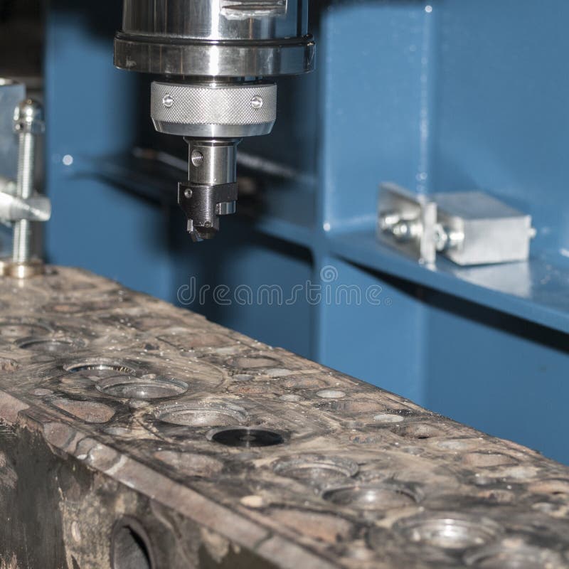 Grinding machine for cylinder head and valve seats stock photos