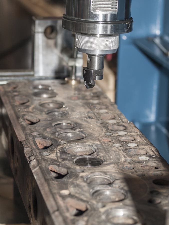 Grinding machine for cylinder head and valve seats royalty free stock photos