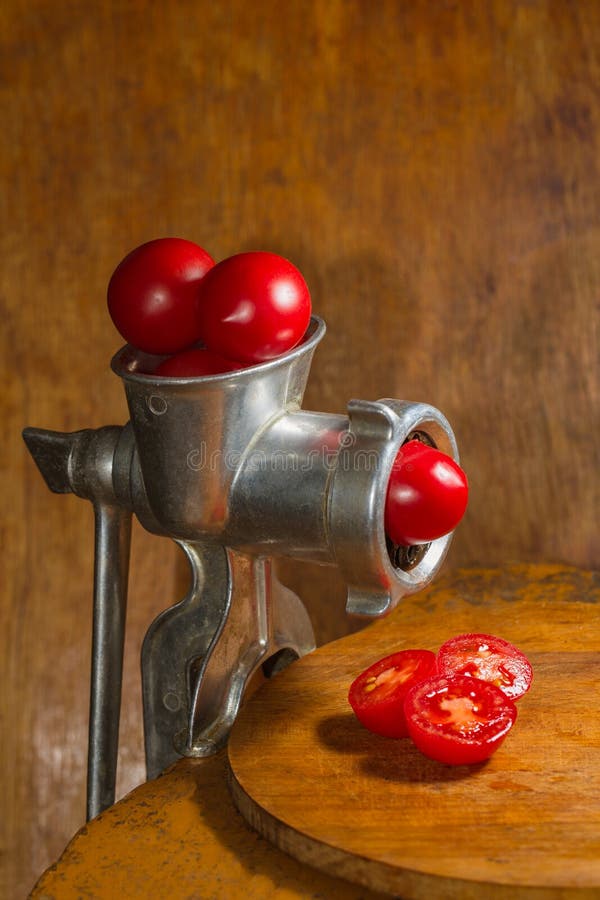 Grinding tomatoes stock photo. Image of cook, taste 188162120