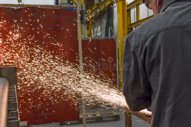 Grinding Wheels Polished, Sprays from the Processing Metal Stock Photo