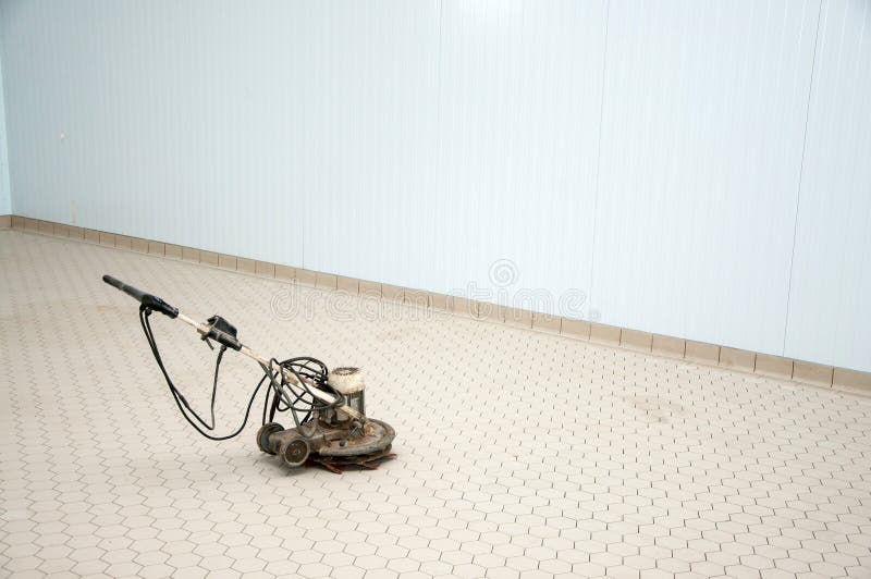 Closeup of Grinding Machine for Ceramic Tile at Workplace Stock Image