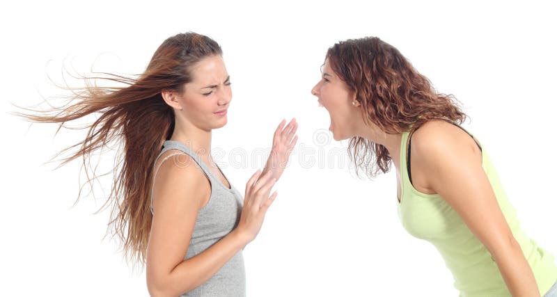 Woman shouting angry to another one isolated on a white background. Woman shouting angry to another one isolated on a white background