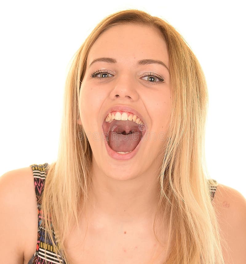 Young blonde teenage girl shouting with mouth open. Young blonde teenage girl shouting with mouth open.