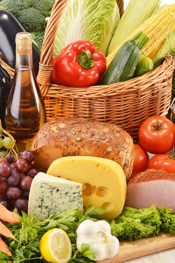 Groceries in Wicker Basket on Kitchen Table Stock Photo - Image of ...