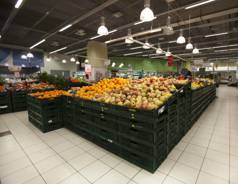 Grocery store. Apples in the foreground royalty free stock photo Grocery store. Apples in the foreground royalty free stock photo