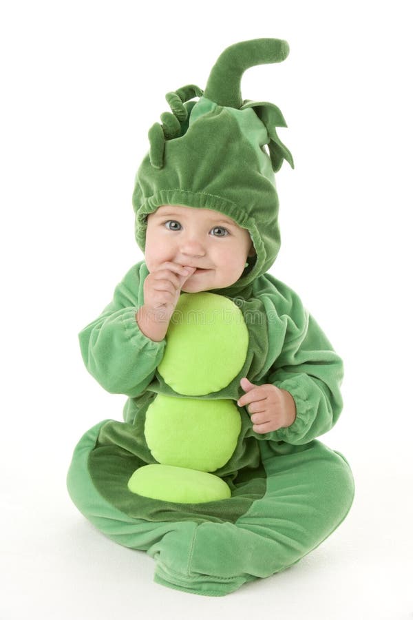 Baby in peas in pod costume on a white background. Baby in peas in pod costume on a white background