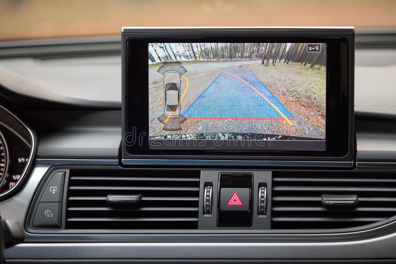 GRODNO, BELARUS - DECEMBER 2019: Audi A6 4G, C7 2.0 TDI 190 Hp 2016 during testdrive Interior with rearview camera dynamic trajectory turning lines and parking assistant steering wheel turned left. GRODNO, BELARUS - DECEMBER 2019: Audi A6 4G, C7 2.0 TDI 190 Hp 2016 during testdrive Interior with rearview camera dynamic trajectory turning lines and parking assistant steering wheel turned left