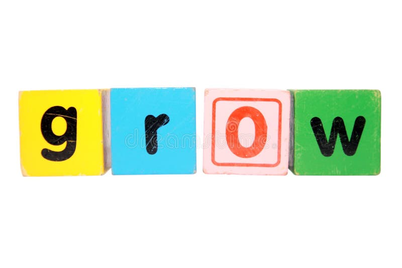 Groeien in speelgoedletters met uitknipmasker stock foto