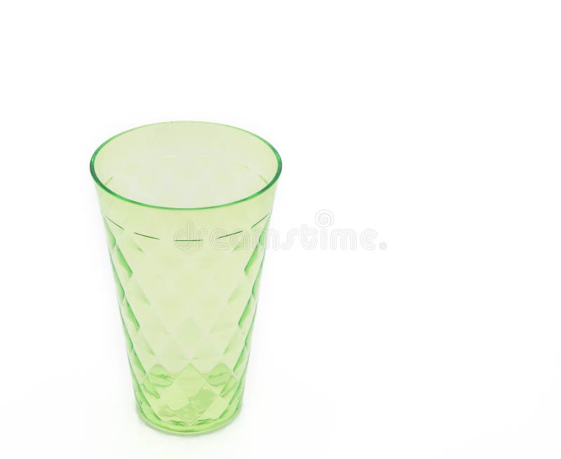 Groene plastic kop stock foto Groene plastic kop stock foto