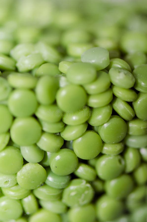 Groene plastic korrels stock afbeeldingen Groene plastic korrels stock afbeeldingen