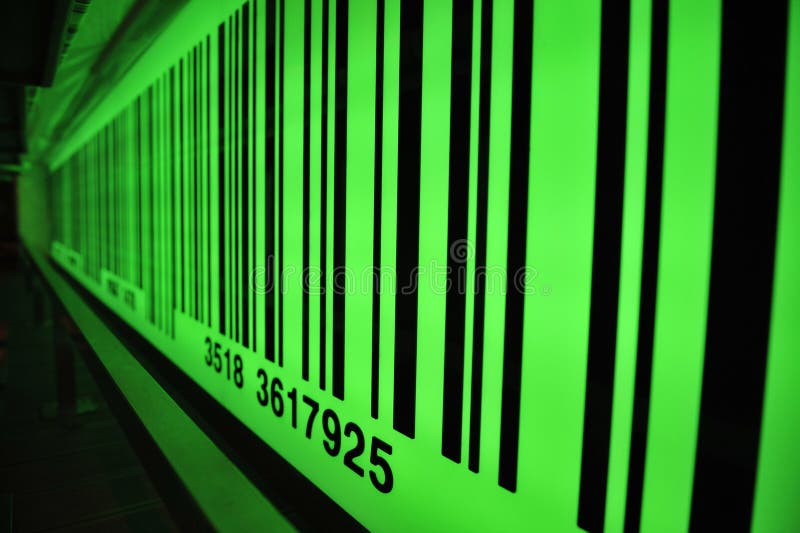 Groene barcode met selectieve focus stock afbeelding
