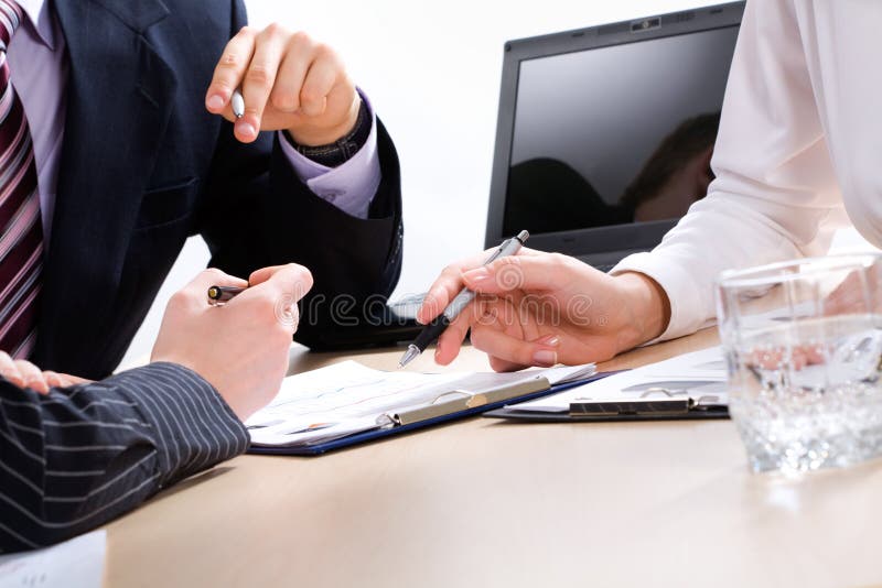 Image of business peopleï¿½s hands during teamwork. Image of business peopleï¿½s hands during teamwork