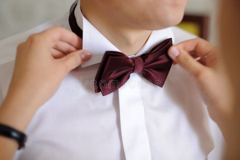 Groom and Bow Tie stock photo. Image of adjusting, celebration 32146842