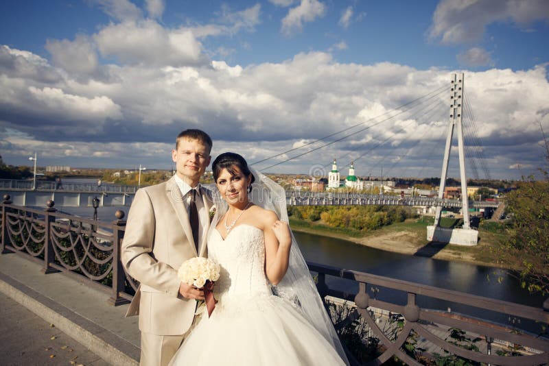 Groom and bride embracing royalty free stock images