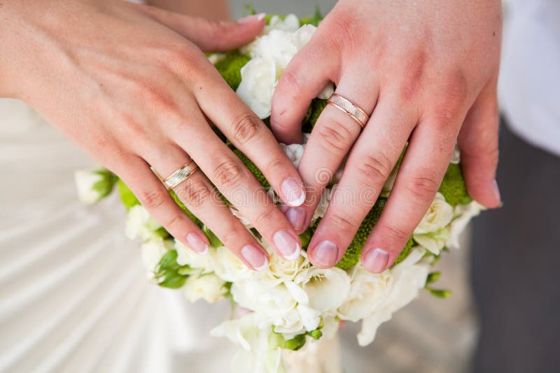 Groom and Bride Holding Hands with Wedding Rings Stock Photo Image of