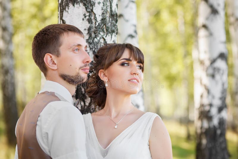 Groom and bride outdoors stock image Groom and bride outdoors stock image