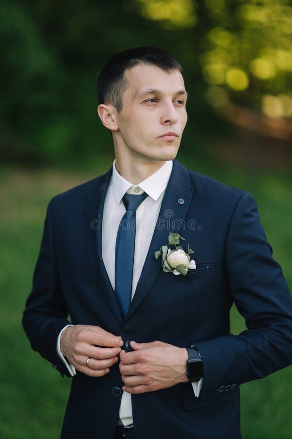 Handsome Groom on His Wedding Day. Man Getting Dressed in the Morning ...