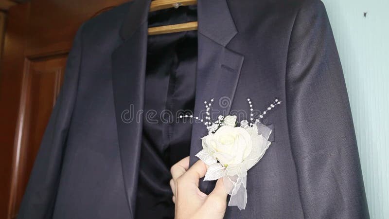 Groom white boutonniere