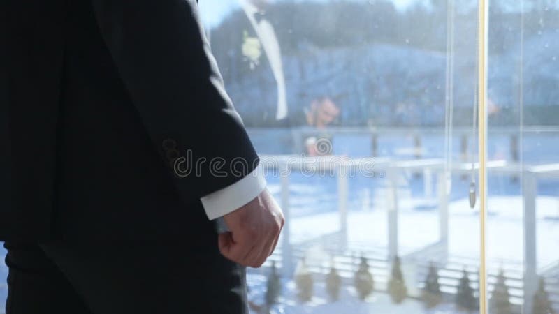 Groom at the window terrace