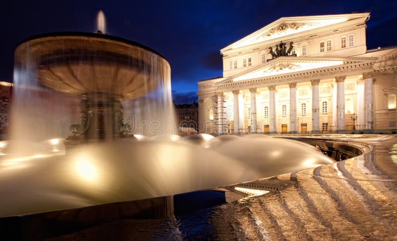 The Bolshoi Theatre (Great Theatre) in Moscow by Joseph Bove. Photo did through fountain at night. The Bolshoi Theatre (Great Theatre) in Moscow by Joseph Bove. Photo did through fountain at night