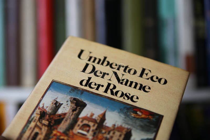 Viersen, Germany - May 9. 2020: Closeup of isolated Umberto Eco bestseller name of the rose book cover. Viersen, Germany - May 9. 2020: Closeup of isolated Umberto Eco bestseller name of the rose book cover