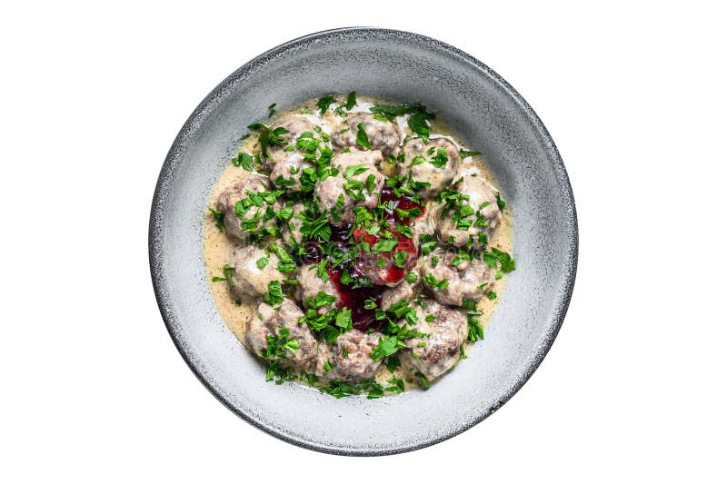Ground Beef Meatballs with Cream Sauce on a Plate. Isolated on White
