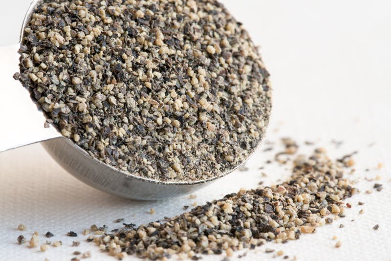 Ground Black Pepper Spilled from a Spice Jar Stock Image Image of
