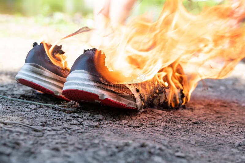 Burning Sneakers, Sports Shoes on Fire. the Concept of Active Training ...