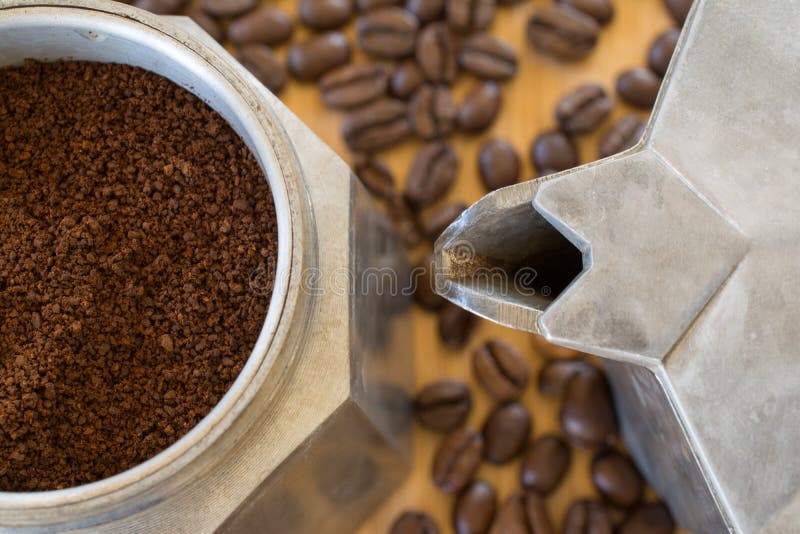 Ground coffee in moka pot. stock image. Image of vintage