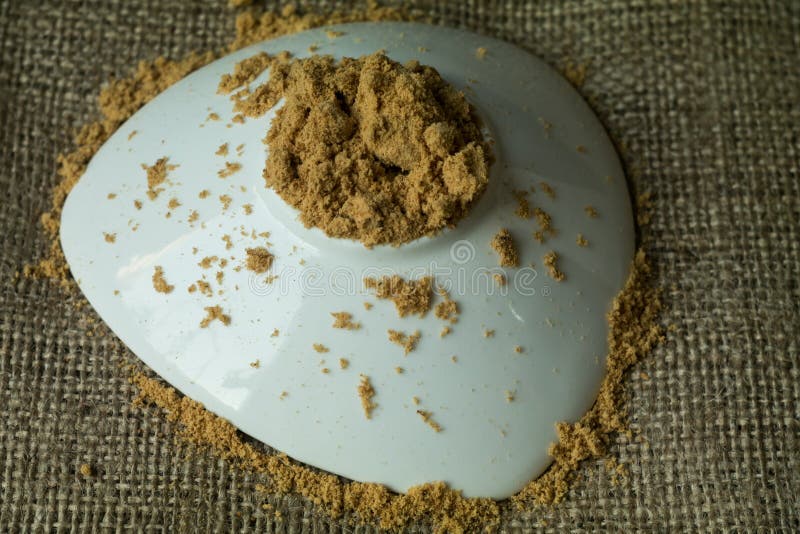 Ground mace in glass bowl. stock image. Image of nutmeg 110400609