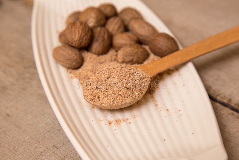 Ground Nutmeg Spices in a Ceramic Plate Stock Photo Image of medicine, ingredient 69062936