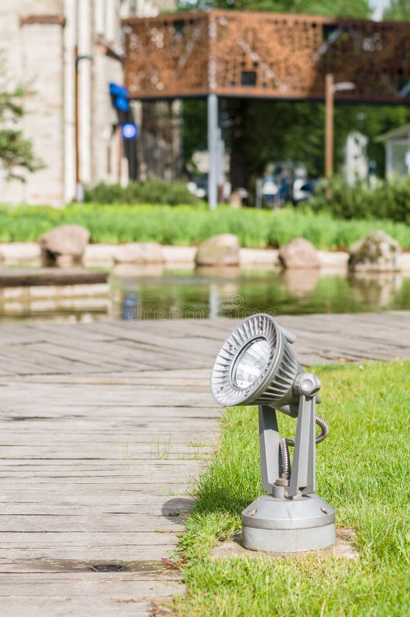 A Ground Spotlight in the Park Stock Photo Image of electric, city