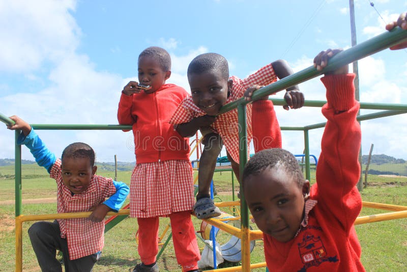 A group of african children playing in a park